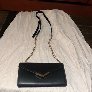 Elegant Black and Gold Women's Bag
